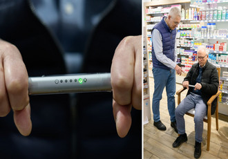 Une personne teste le dispositif prévenant les risques d'avc dans une pharmacie